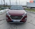Красный Хендай Туксон, объемом двигателя 2.4 л и пробегом 79 тыс. км за 28500 $, фото 1 на Automoto.ua