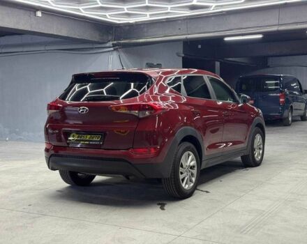 Червоний Хендай Туксон, об'ємом двигуна 2 л та пробігом 149 тис. км за 13800 $, фото 5 на Automoto.ua