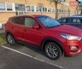 Красный Хендай Туксон, объемом двигателя 2 л и пробегом 157 тыс. км за 20000 $, фото 2 на Automoto.ua