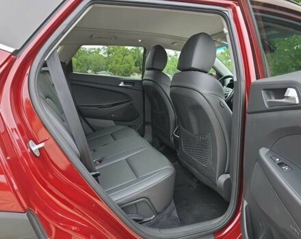 Красный Хендай Туксон, объемом двигателя 2.4 л и пробегом 38 тыс. км за 11100 $, фото 11 на Automoto.ua