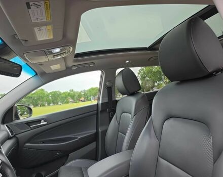 Красный Хендай Туксон, объемом двигателя 2.4 л и пробегом 38 тыс. км за 11100 $, фото 8 на Automoto.ua