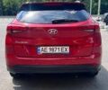Красный Хендай Туксон, объемом двигателя 2 л и пробегом 115 тыс. км за 22600 $, фото 6 на Automoto.ua