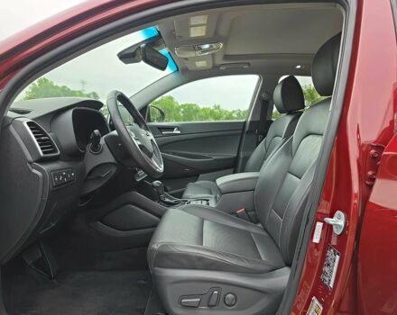 Красный Хендай Туксон, объемом двигателя 2.4 л и пробегом 38 тыс. км за 11100 $, фото 6 на Automoto.ua