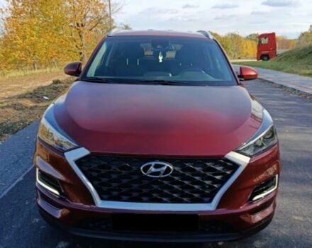 Красный Хендай Туксон, объемом двигателя 2 л и пробегом 130 тыс. км за 13000 $, фото 2 на Automoto.ua