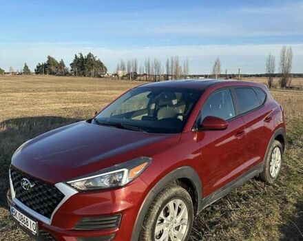 Червоний Хендай Туксон, об'ємом двигуна 2 л та пробігом 130 тис. км за 19200 $, фото 4 на Automoto.ua