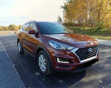 Красный Хендай Туксон, объемом двигателя 2 л и пробегом 130 тыс. км за 13000 $, фото 3 на Automoto.ua