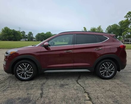 Красный Хендай Туксон, объемом двигателя 2.4 л и пробегом 38 тыс. км за 11100 $, фото 3 на Automoto.ua