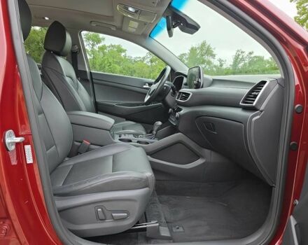 Красный Хендай Туксон, объемом двигателя 2.4 л и пробегом 38 тыс. км за 11100 $, фото 9 на Automoto.ua