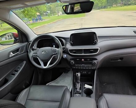 Красный Хендай Туксон, объемом двигателя 2.4 л и пробегом 38 тыс. км за 11100 $, фото 7 на Automoto.ua