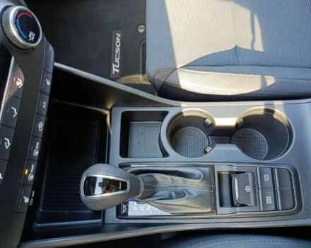 Червоний Хендай Туксон, об'ємом двигуна 2 л та пробігом 74 тис. км за 9600 $, фото 12 на Automoto.ua