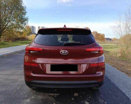 Красный Хендай Туксон, объемом двигателя 2 л и пробегом 131 тыс. км за 10450 $, фото 6 на Automoto.ua