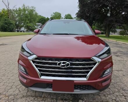 Красный Хендай Туксон, объемом двигателя 2.4 л и пробегом 38 тыс. км за 11100 $, фото 1 на Automoto.ua