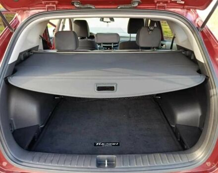 Красный Хендай Туксон, объемом двигателя 2 л и пробегом 131 тыс. км за 10450 $, фото 10 на Automoto.ua