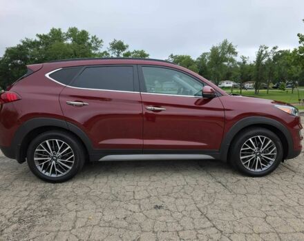 Красный Хендай Туксон, объемом двигателя 2.4 л и пробегом 38 тыс. км за 11100 $, фото 5 на Automoto.ua