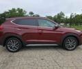 Красный Хендай Туксон, объемом двигателя 2.4 л и пробегом 38 тыс. км за 11100 $, фото 5 на Automoto.ua