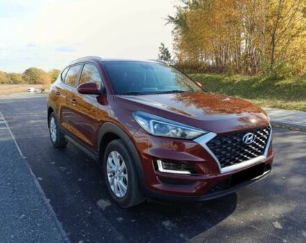 Красный Хендай Туксон, объемом двигателя 2 л и пробегом 131 тыс. км за 10450 $, фото 3 на Automoto.ua