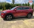Красный Хендай Туксон, объемом двигателя 2 л и пробегом 30 тыс. км за 31000 $, фото 1 на Automoto.ua