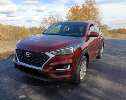 Червоний Хендай Туксон, об'ємом двигуна 2 л та пробігом 74 тис. км за 9600 $, фото 2 на Automoto.ua