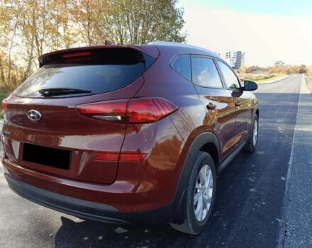 Червоний Хендай Туксон, об'ємом двигуна 2 л та пробігом 74 тис. км за 9600 $, фото 5 на Automoto.ua