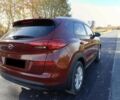 Червоний Хендай Туксон, об'ємом двигуна 2 л та пробігом 74 тис. км за 9600 $, фото 5 на Automoto.ua