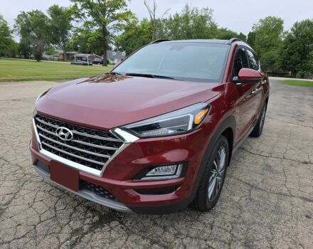 Красный Хендай Туксон, объемом двигателя 2.4 л и пробегом 38 тыс. км за 11100 $, фото 2 на Automoto.ua