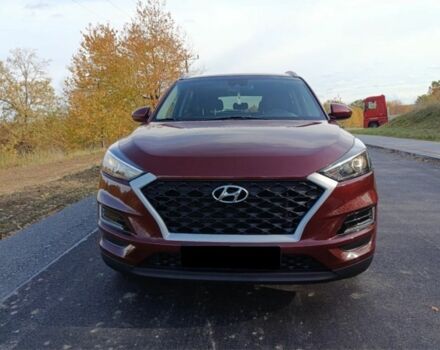Красный Хендай Туксон, объемом двигателя 2 л и пробегом 130 тыс. км за 13000 $, фото 1 на Automoto.ua