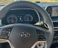 Червоний Хендай Туксон, об'ємом двигуна 2 л та пробігом 130 тис. км за 19200 $, фото 17 на Automoto.ua