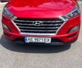 Красный Хендай Туксон, объемом двигателя 2 л и пробегом 115 тыс. км за 22600 $, фото 1 на Automoto.ua