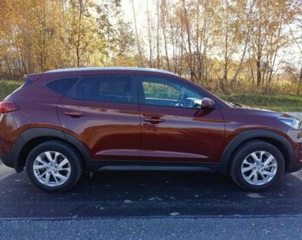 Червоний Хендай Туксон, об'ємом двигуна 2 л та пробігом 74 тис. км за 9600 $, фото 6 на Automoto.ua