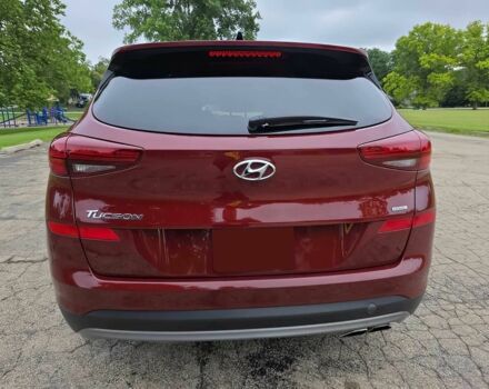 Красный Хендай Туксон, объемом двигателя 2.4 л и пробегом 38 тыс. км за 11100 $, фото 4 на Automoto.ua