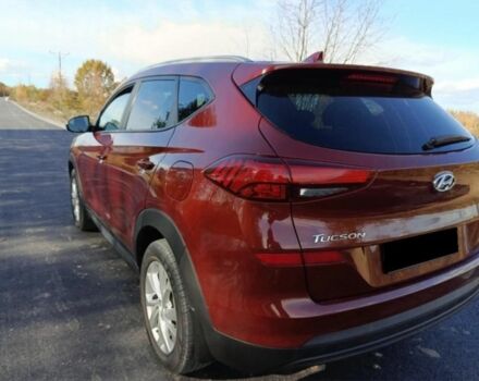 Красный Хендай Туксон, объемом двигателя 2 л и пробегом 130 тыс. км за 13000 $, фото 7 на Automoto.ua