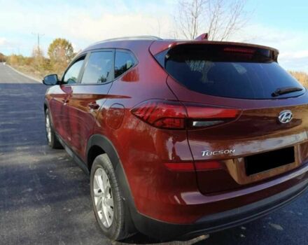 Красный Хендай Туксон, объемом двигателя 2 л и пробегом 131 тыс. км за 10450 $, фото 7 на Automoto.ua