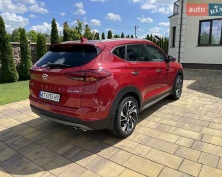 Красный Хендай Туксон, объемом двигателя 2 л и пробегом 30 тыс. км за 31000 $, фото 5 на Automoto.ua
