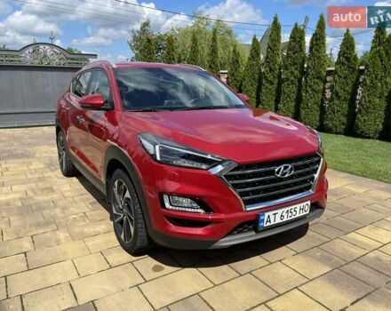 Красный Хендай Туксон, объемом двигателя 2 л и пробегом 30 тыс. км за 31000 $, фото 3 на Automoto.ua