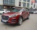 Красный Хендай Туксон, объемом двигателя 2 л и пробегом 116 тыс. км за 19200 $, фото 1 на Automoto.ua