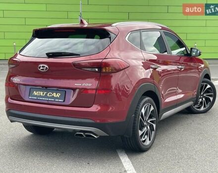 Красный Хендай Туксон, объемом двигателя 2 л и пробегом 64 тыс. км за 30500 $, фото 5 на Automoto.ua