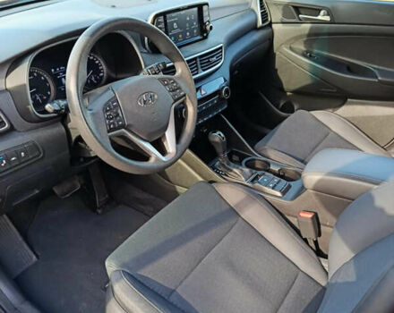 Красный Хендай Туксон, объемом двигателя 2 л и пробегом 97 тыс. км за 20000 $, фото 9 на Automoto.ua