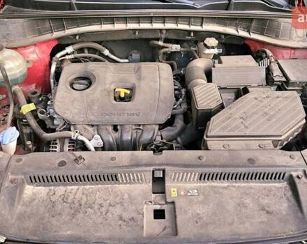 Красный Хендай Туксон, объемом двигателя 2 л и пробегом 94 тыс. км за 19500 $, фото 12 на Automoto.ua