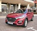 Красный Хендай Туксон, объемом двигателя 2 л и пробегом 94 тыс. км за 19500 $, фото 1 на Automoto.ua