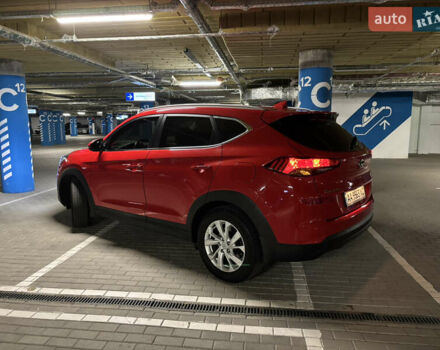 Красный Хендай Туксон, объемом двигателя 2 л и пробегом 95 тыс. км за 21500 $, фото 5 на Automoto.ua