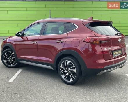 Красный Хендай Туксон, объемом двигателя 2 л и пробегом 64 тыс. км за 30500 $, фото 10 на Automoto.ua
