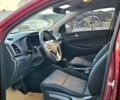 Красный Хендай Туксон, объемом двигателя 2 л и пробегом 94 тыс. км за 19500 $, фото 15 на Automoto.ua