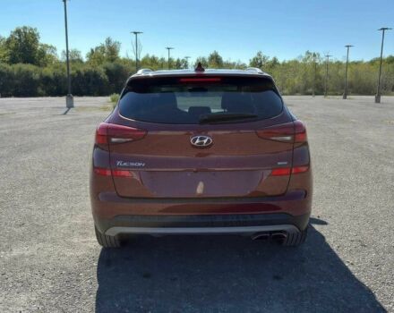 Червоний Хендай Туксон, об'ємом двигуна 2.4 л та пробігом 46 тис. км за 13500 $, фото 5 на Automoto.ua