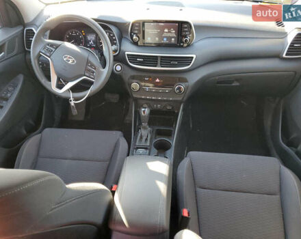 Красный Хендай Туксон, объемом двигателя 2 л и пробегом 71 тыс. км за 13300 $, фото 7 на Automoto.ua