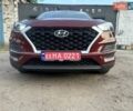 Красный Хендай Туксон, объемом двигателя 2 л и пробегом 119 тыс. км за 15500 $, фото 2 на Automoto.ua