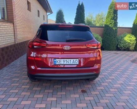 Червоний Хендай Туксон, об'ємом двигуна 2 л та пробігом 32 тис. км за 16700 $, фото 23 на Automoto.ua