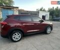Красный Хендай Туксон, объемом двигателя 2 л и пробегом 119 тыс. км за 15500 $, фото 7 на Automoto.ua