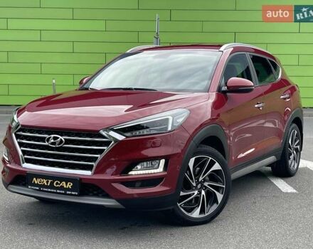 Красный Хендай Туксон, объемом двигателя 2 л и пробегом 64 тыс. км за 30500 $, фото 1 на Automoto.ua