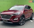 Красный Хендай Туксон, объемом двигателя 2 л и пробегом 64 тыс. км за 30500 $, фото 1 на Automoto.ua