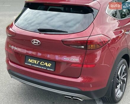 Красный Хендай Туксон, объемом двигателя 2 л и пробегом 64 тыс. км за 30500 $, фото 7 на Automoto.ua